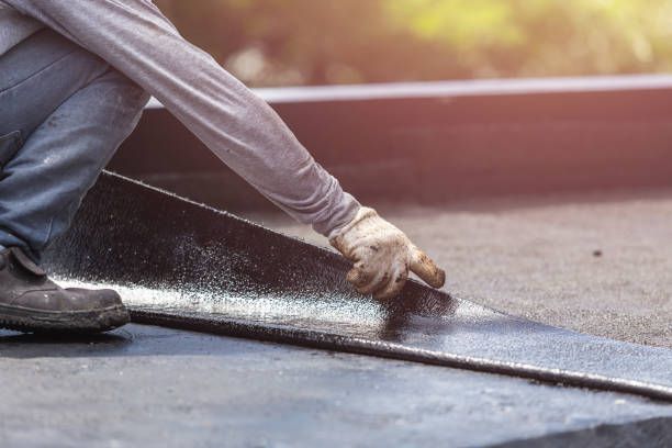 Professional Waterproofing technician working in Warsaw, VA